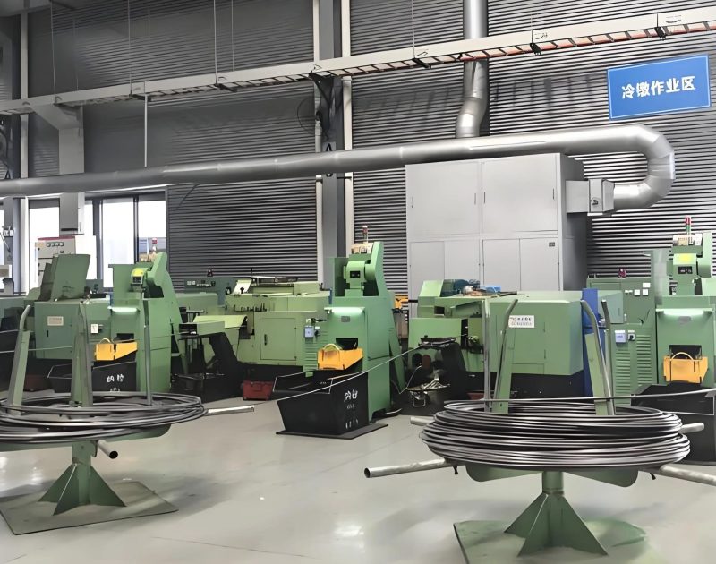 Multi-station cold heading machine